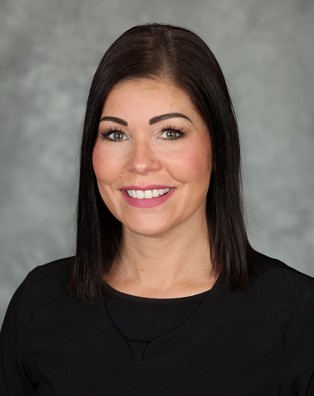 A headshot of Jennifer who has medium length black hair.